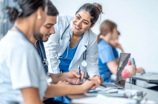 Medical students chatting in a classroom
